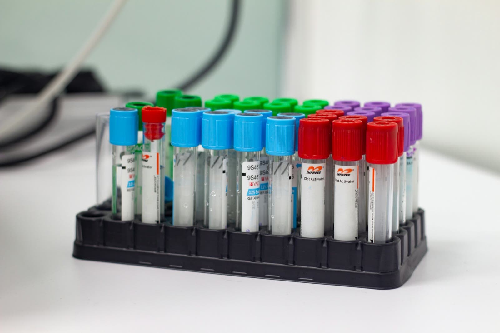 A rack of laboratory collection tubes